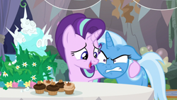 Size: 1920x1080 | Tagged: safe, derpibooru import, screencap, starlight glimmer, trixie, pony, unicorn, student counsel, angry, cake, cross-popping veins, cupcake, duo, equinox cake, female, floppy ears, food, mare, side hug