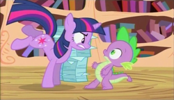 Size: 720x415 | Tagged: safe, derpibooru import, screencap, spike, twilight sparkle, dragon, the crystal empire, spoiler:s03