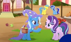 Size: 718x429 | Tagged: safe, derpibooru import, screencap, lemon hearts, minuette, starlight glimmer, trixie, unicorn, rainbow roadtrip, apple, female, food, mare, saddle bag