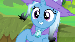 Size: 1920x1080 | Tagged: safe, derpibooru import, screencap, trixie, pony, unicorn, a horse shoe-in, cape, clothes, cute, diatrixes, female, hat, leak, mare, on back, smiling, solo, trixie's cape, trixie's hat