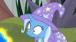 Size: 1680x944 | Tagged: safe, derpibooru import, screencap, trixie, bee, flash bee, insect, pony, unicorn, a horse shoe-in, cape, clothes, female, hat, i've made a huge mistake, mare, trixie's cape, trixie's hat