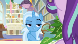 Size: 1600x900 | Tagged: safe, derpibooru import, screencap, phyllis, starlight glimmer, trixie, pony, unicorn, a horse shoe-in, book, bookshelf, ceiling light, desk, female, globe, house plant, lidded eyes, mare, office, philodendron, potted plant, raised eyebrow, raised hoof, scroll, shelf, window
