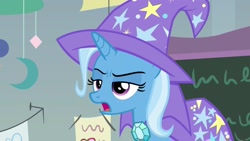 Size: 1920x1080 | Tagged: safe, derpibooru import, screencap, trixie, pony, unicorn, a horse shoe-in, cape, clothes, female, hat, lidded eyes, mare, open mouth, solo, trixie's cape, trixie's hat