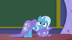 Size: 1280x720 | Tagged: safe, derpibooru import, screencap, trixie, pony, a matter of principals, cape, chalkboard, clothes, hat, trixie's cape, trixie's hat