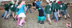 Size: 1024x411 | Tagged: artist needed, safe, artist:jimthecactus, pinkie pie, queen chrysalis, human, 2014, anime, attack on titan, bronycon, convention, cosplay, crossover, fight, irl, irl human, photo, solo