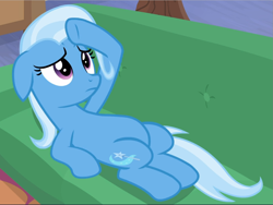 Size: 1253x940 | Tagged: safe, derpibooru import, screencap, trixie, pony, road to friendship, cropped, hoof on head, lying down, sofa, solo, worried