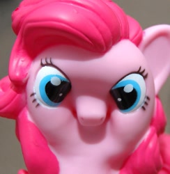 Size: 487x500 | Tagged: safe, pinkie pie, faic, irl, ponkie poy, reaction image, scrunchy face, solo, toy, wat