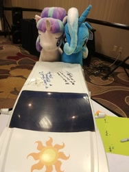 Size: 1560x2080 | Tagged: safe, derpibooru import, princess celestia, starlight glimmer, trixie, autograph, cutie mark, harmonycon 2020, irl, kelly sheridan, meta, photo, pickup truck, plushie, radio control, twitter