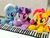 Size: 1024x768 | Tagged: safe, artist:nekokevin, derpibooru import, sunset shimmer, trixie, twilight sparkle, unicorn twilight, pony, unicorn, female, irl, keyboard, magical trio, mare, open mouth, photo, plushie, sitting, smiling, trio, underhoof