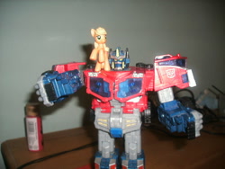 Size: 640x480 | Tagged: safe, applejack, blind bag, irl, optimus prime, photo, toy, transformers, transformers cybertron