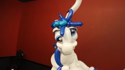 Size: 960x539 | Tagged: safe, artist:noordinaryballoonman, shining armor, pony, unicorn, balloon, balloon animal, derp, irl, photo