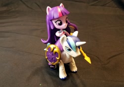 Size: 1600x1126 | Tagged: safe, shining armor, twilight sparkle, equestria girls, clothes, doll, equestria girls minis, eqventures of the minis, guardians of harmony, humans riding ponies, misadventures of the guardians, riding, skirt, toy