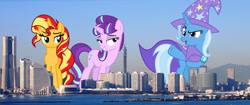 Size: 4000x1679 | Tagged: safe, artist:8-notes, artist:cloudyglow, artist:starlessnight22, artist:theotterpony, derpibooru import, edit, starlight glimmer, sunset shimmer, trixie, pony, unicorn, female, giant pony, giant starlight glimmer, giant trixie, giant unicorn, giant/macro sunset shimmer, highrise ponies, macro, mare, mega trixie, trio, vector, vector edit