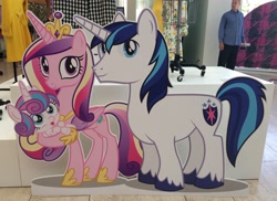 Size: 3106x2263 | Tagged: safe, princess cadance, princess flurry heart, shining armor, pony, unicorn, cardboard cutout, irl, my little pony through the years, photo