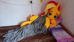 Size: 960x546 | Tagged: artist needed, safe, sunset shimmer, pony, bedroom eyes, irl, life size, photo, plushie