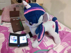 Size: 2592x1944 | Tagged: artist needed, safe, derpibooru import, twilight sparkle, human, bed, dsi, glasses, horn ring, irl, irl human, jin, nintendo ds, photo, plushie, the legend of zelda, triforce