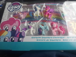 Size: 4160x3120 | Tagged: safe, fluttershy, pinkie pie, princess cadance, princess celestia, princess flurry heart, rainbow dash, rarity, shining armor, twilight sparkle, alicorn, earth pony, pegasus, pony, unicorn, baby, box, female, husband and wife, irl, looking at you, male, photo, rainbow, raised hoof, rearing, spread wings, toy, walmart, wings