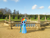 Size: 2048x1536 | Tagged: safe, artist:harpycross, derpibooru import, rainbow dash, fountain, irl, photo, ponies in real life, pose, smiling, solo