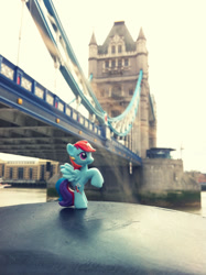 Size: 1000x1339 | Tagged: safe, artist:pinkiepirates, rainbow dash, bridge, figure, irl, london, photo, ponies around the world, tower bridge, toy