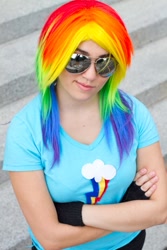 Size: 427x640 | Tagged: safe, artist:magyktrix, rainbow dash, human, clothes, cosplay, crossed arms, fingerless gloves, gloves, irl, irl human, photo, solo, sunglasses