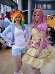 Size: 500x667 | Tagged: source needed, safe, artist:aoime, artist:enjinight, fluttershy, rainbow dash, human, convention, cosplay, ears, irl, irl human, photo, wings