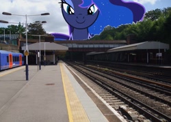 Size: 1565x1118 | Tagged: safe, artist:hereward, princess luna, alicorn, pony, giant ponies in real life, giant pony, macro, photoshop, railway station, smiling, smirk, weybridge