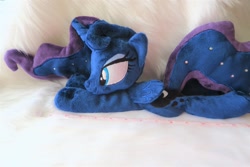 Size: 1024x683 | Tagged: safe, artist:kazzysart, princess luna, alicorn, pony, beanie (plushie), female, folded wings, horn, irl, mare, missing accessory, photo, plushie, prone, solo, wings