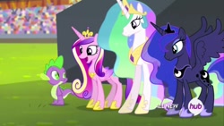 Size: 1280x720 | Tagged: safe, screencap, princess cadance, princess celestia, princess luna, spike, alicorn, dragon, pony, equestria games (episode), all new, crown, crystal stadium, female, happy, hub logo, jewelry, male, mare, open mouth, regalia, spread wings, text, wings