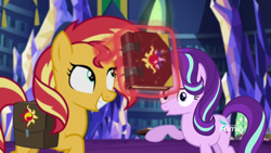 Size: 1280x720 | Tagged: safe, screencap, starlight glimmer, sunset shimmer, pony, unicorn, equestria girls, mirror magic, spoiler:eqg specials, book, discovery family logo, duo, female, grin, happy, it happened, journal, levitation, magic, mai waifus have met, mare, open mouth, smiling, telekinesis, twilight's castle