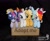 Size: 1714x1400 | Tagged: safe, artist:allunacraft, derpibooru import, applejack, rainbow dash, rarity, sunset shimmer, twilight sparkle, pony, adoption, applejack's hat, box, bronybait, cowboy hat, female, hat, horn, irl, mare, photo, plushie