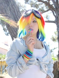 Size: 1854x2448 | Tagged: safe, artist:nyusho, rainbow dash, human, cosplay, food, goggles, irl, irl human, lollipop, photo, solo