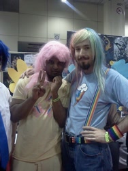 Size: 540x720 | Tagged: source needed, safe, fluttershy, rainbow dash, human, convention, cosplay, irl, irl human, photo, shipping