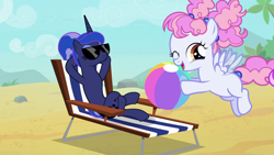 Size: 1920x1080 | Tagged: safe, screencap, cotton puff, princess luna, alicorn, pegasus, pony, between dark and dawn, alternate hairstyle, background pony, beach, beach ball, beach chair, blank flank, crossed hooves, crossed legs, cute, female, filly, flapping, flying, hair bun, having fun, hooves behind head, looking at someone, reclining, relaxing, smiling, spread wings, sunglasses, tropical, vacation, we don't normally wear clothes