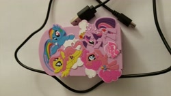 Size: 5312x2988 | Tagged: safe, derpibooru import, fluttershy, pinkie pie, rainbow dash, twilight sparkle, twilight sparkle (alicorn), alicorn, earth pony, pegasus, pony, battery, cloud, female, mare, merchandise, micro usb, usb