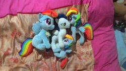 Size: 960x540 | Tagged: safe, artist:onlyfactory, derpibooru import, rainbow dash, soarin', pony, bootleg, irl, photo, plushie