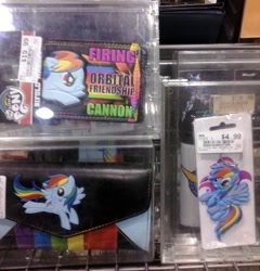 Size: 800x834 | Tagged: safe, photographer:drpain, rainbow dash, irl, merchandise, movie trading company, orbital friendship cannon, photo