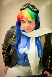 Size: 800x1200 | Tagged: safe, artist:riveth, rainbow dash, human, clothes, convention, cosplay, goggles, irl, irl human, jacket, kamecon, kamecon 2013, photo, queen city kamikaze, scarf, solo