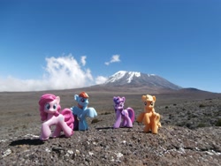 Size: 4608x3456 | Tagged: safe, artist:yagyag, derpibooru import, applejack, pinkie pie, rainbow dash, twilight sparkle, absurd resolution, figure, irl, mount kilimanjaro, mountain, photo, ponies around the world, tanzania, toy