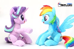 Size: 1200x800 | Tagged: safe, artist:nekokevin, rainbow dash, starlight glimmer, pegasus, pony, unicorn, series:nekokevin's glimmy, cute, dashabetes, duo, female, glimmerbetes, irl, looking at each other, mare, open mouth, photo, plushie, raised hoof, simple background, sitting, smiling, spread wings, underhoof, watermark, white background, wings