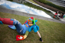 Size: 1600x1067 | Tagged: safe, artist:coo-cu, artist:moorina, rainbow dash, human, 2013, clothes, cosplay, fingerless gloves, gloves, goggles, irl, irl human, jeans, photo, scarf, solo, torn clothes