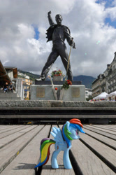 Size: 2848x4288 | Tagged: safe, artist:steam-loco, derpibooru import, rainbow dash, freddie mercury, irl, montreux, photo, ponies around the world, statue, switzerland, toy