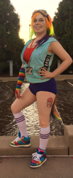 Size: 640x1549 | Tagged: safe, artist:alvrexadpot, derpibooru import, rainbow dash, human, arm warmers, bandage, clothes, cosplay, costume, goggles, hoodie, irl, irl human, kneesocks, nekocon, photo, pose, shorts, socks, solo, tail, tattoo, wig