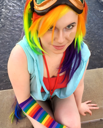 Size: 1213x1512 | Tagged: safe, artist:alvrexadpot, derpibooru import, rainbow dash, human, arm warmers, bandage, clothes, cosplay, costume, goggles, hoodie, irl, irl human, nekocon, photo, solo, tail, water, wig