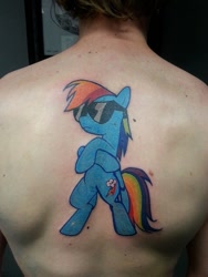 Size: 540x720 | Tagged: safe, rainbow dash, human, pegasus, pony, back, backwards cutie mark, bipedal, female, irl, irl human, mare, photo, solo, sunglasses, tattoo