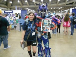 Size: 960x720 | Tagged: artist needed, safe, rainbow dash, human, 2014, bronycon, convention, cosplay, irl, irl human, optimus prime, photo, transformers