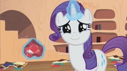 Size: 853x480 | Tagged: safe, screencap, rarity, pony, unicorn, secret of my excess, cute, dilated pupils, female, fire ruby, golden oaks library, happy, looking at you, mare, raribetes, smiling, solo