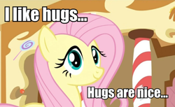 Size: 922x564 | Tagged: safe, edit, edited screencap, screencap, fluttershy, pegasus, pony, bronybait, female, hug, image macro, mare, smiling, solo