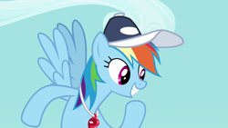 Size: 1280x720 | Tagged: safe, derpibooru import, screencap, rainbow dash, pegasus, pony, hurricane fluttershy, cap, excited, hat, raised hoof, solo, spread wings, whistle