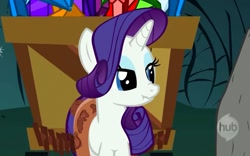 Size: 925x577 | Tagged: safe, screencap, rarity, pony, unicorn, a dog and pony show, female, horn, mare, scrunchy face, solo