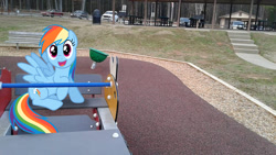 Size: 960x540 | Tagged: safe, artist:spaceponies, artist:tokkazutara1164, derpibooru import, rainbow dash, pony, bence, car, fence, happy, irl, park, photo, playground, ponies in real life, solo, table, vector